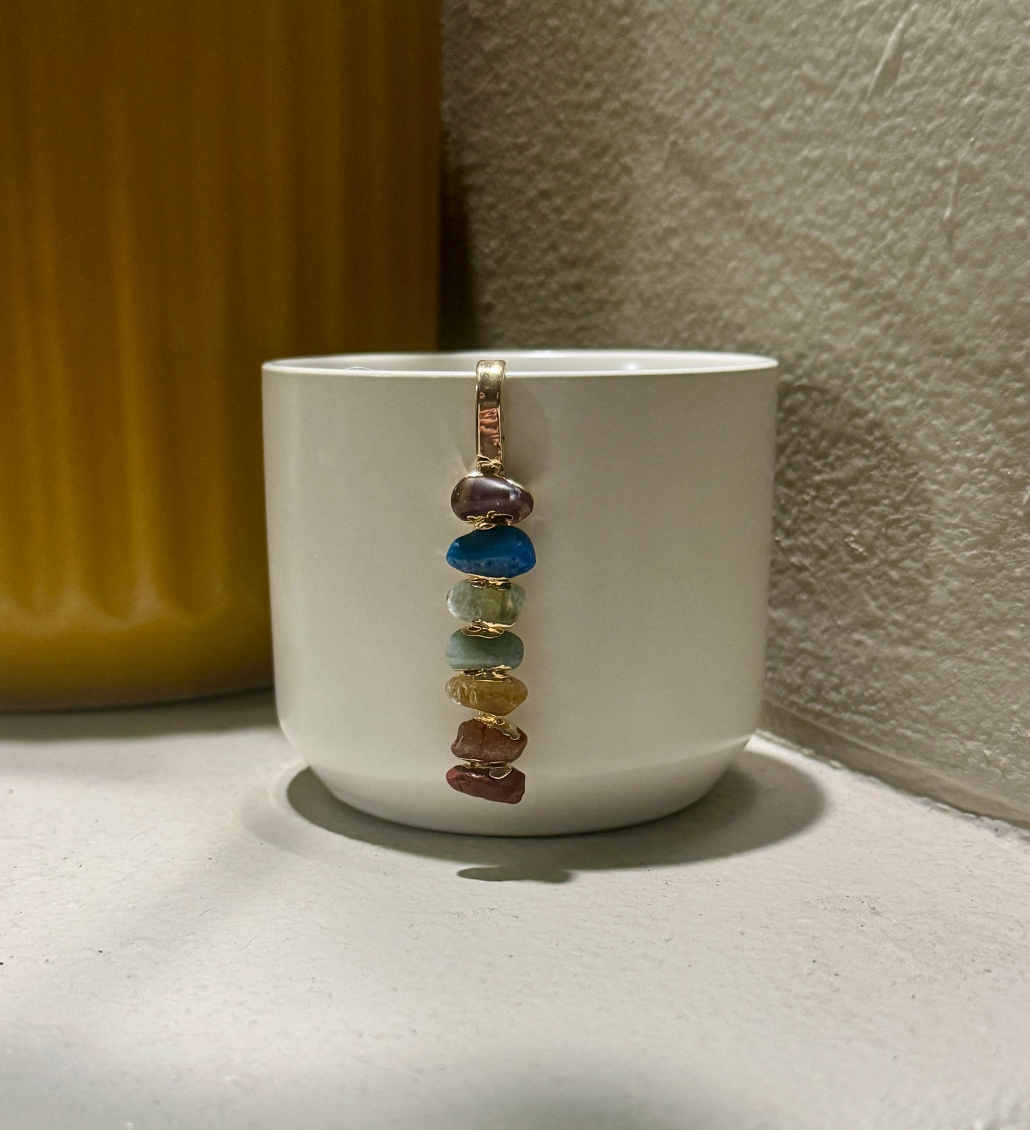 White Ceramic Pot with Aligned Chakra Pendant